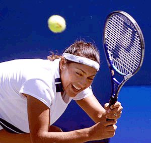 Paola Suarez of Argentina, returns a shot during her match with Anna Kournikova at the Bausch & Lomb Championships on Saturday