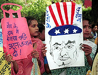 Activists of All India Progressive Women's Association demonstrating in New Delhi on Monday in protest against the steep rise in prices of all essential commodities