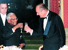 President K. R. Narayanan raises a toast with his French counterpart Jacques Chirac.