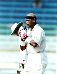 Vinod Kambli after completing his century in the Ranji Trophy finals at Wankhade stadium in Mumbai on Wednesday