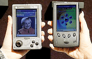 Pocket PC models from Casio (left) and Hewlett-Packard unveiled on Wednesday in New York by Microsoft and several partners. Microsoft will work with Hewlett-Packard, Casio, and Compaq to make the full-featured hand-held machines.