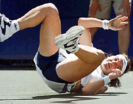 Arantxa Sanchez-Vicario of Spain takes a tumble 