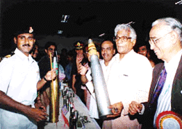 Defence Minister George Fernandes seen with a Naval weapon made with the help of the small scale sector. He inaugurated an exhibition in Chennai on Saturday on the SSTS contribution to defence production