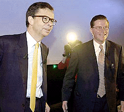 France's Renault SA chairman and chief executive officer Louis Schweitzer, left, and Sweden's AB Volvo chairman Leif Johansson, smile upon their arrival for a press conference in Paris o Tuesday.