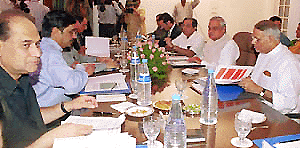 Prime Minister Atal Behari Vajpayee and Finance Minister Yashwant Sinha at a meeting with industrialists, in New Delhi on Saturday.  Photo by Sondeep Shankar