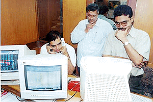 Anxious brokers in Mumbai as the market dropped 300 points in the morning trading on Tuesday.