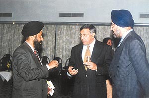 Ujjal Dosanjh (right) making a point