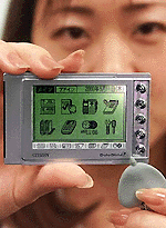 Citizens unveils the worlds smallest and lightest PDA gadget DataSlim 2 in Tokyo on Thursday.  AFP