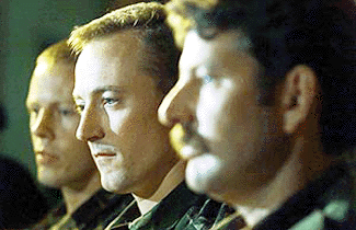 Unarmed UN observers (from left) Major David Lingard (New Zealand), Lieut Paul Rowland and Major Andrew Samsonoff, both of Britain, look on as they recount their harrowing story of how they escaped from RUF held territory at a press conference in Freetown on Friday