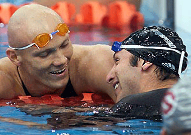 Ian Thorpe (R) is congratulated by Michael Klim (L) after the final of the men's 200 m freestyle final during the Australian Olympic selection swimming trials in Sydney on Monday. � AFP photo