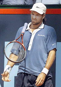 Australian tennis player Patrick Rafter reacts to a lost point during his match against South African Wayne Ferreira at the ATP tournament in Hamburg on Tuesday
