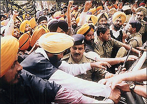 Activists of the All-India Shiromani Youth Akali Dal, a wing of the Sarb Hind Shiromani Akali Dal, stage a demonstration in Chandigarh on Wednesday against the Badal Government.