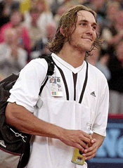 France's Arnaud Di Pasquale smiles after his match against Pete Sampras at the Tennis Masters Series 2000 tournament in Hamburg, northern Germany, on Wednesday.