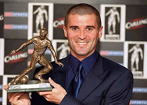 Manchester United and Republic of Ireland captain Roy Keene holds the Football Writers' Association Footballer of the Year Trophy, after he was presented with the statue at the annual general meeting of the Association in London's Royal Lancaster Hotel on Thursday