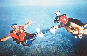 Sanders shooting a sky diver... picture perfect
