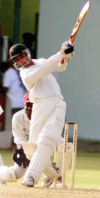 Imram Nazir of Pakistan hits West Indies captian Jimmy Adams, not in picture, for 4 runs during his 94 not out on the third day of the second test match at the Kensington Oval in Bridgetown, Barbados on Saturday