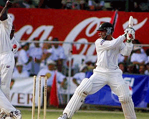 Pakistan captain Moin Khan is bowled by West Indies captain Jimmy Adams, not in picture, during the fouth day of the second test match at the Kensington Oval in Bridgetown, Barbados on Sunday