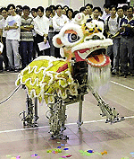 A robot lion dancer performs in the open category competition at the Singapore Robotics Games in Singapore on Tuesday. The annual event attracted close to 350 robot entries by students.�   AFP photo