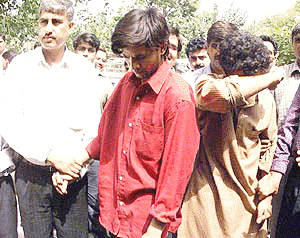 Abid and Javed, suspected to be having links with the ISI, being produced before the Patiala House Court in New Delhi on Tuesday.  PTI photo