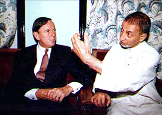 Executive member of Hurriyat conference and chief spokesman of the party, Prof. Abdul Gani explaining Hurriyat's view point to the visiting British High Commissioner, Rob Young during a meeting at Rajbagh in Srinagar on Tuesday