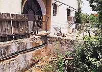 The electricity connection coming from the tubewell and turning into the common wall between the SDE's house and the tubewell on Tuesday. � A Tribune photograph