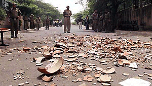 Earthen water vessel broken by the BJP activists at the Delhi Jal Board office in New Delhi on Wednesday in in protest against the shortage of drinking water in the Capital. � PTI photo