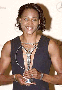 US athletics champion Marion Jones poses with his Laureus Sports Award of the World Sportswoman of the Year on Thursday in Monaco