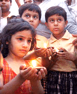 Children of Kargil War Heroes at a candle light procession at India Gate in New Delhi on Friday on the occasion of first anniversary of Operation Vijay