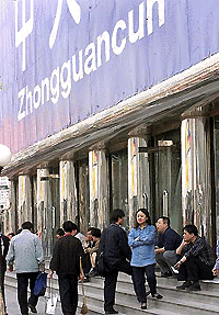 Computer enthusiasts gather at Beijing's main computer district in Zhongguancun, north east of the capital city on Sunday, to look for the latest hardwares and softwares available on the market. Desktop computer sales in China rose nearly 11 per cent in the first quarter year on year to $ 435 million, while notebook sales were up 8.1 per cent with 93,414 units sold