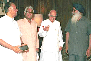 Punjab Chief Minister Parkash Singh Badal with Union Home Minister L. K. Advani, Defence Minister George Fernandes and Deputy Chairman Planning Commission K. C. Pant in New Delhi on Tuesday continuing talks regarding the problems faced by border districts.   Photo by Sondeep Shankar