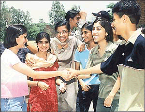 Gleeful students congratulate each other after their success in the CBSE plus two examinations whose results were declared on Wednesday.