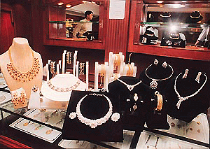 Dazzling diamonds, said to be a woman's best friend, beckon prospective buyers in a jewellery shop at Sector 22 in Chandigarh. �Tribune photo by Parvesh Cha