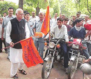Home Minister L.K. Advani flags off from New Delhi on Friday a group of motorcyclists from Haryana to visit the Sindhu Festival in the Ladakh region