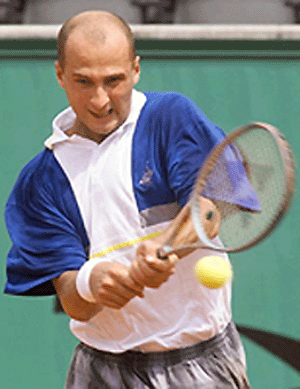 Ukraine's Andrei Medvedev hits a return to Argentina's Agustin Calleri during their 3rd round match on Saturday at the French Open in Roland Garros in Paris. Medvedev won 6-3, 3-6, 6-4, 6-3. � AFP�photo