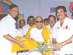 Malayalam superstar Mammooty offers a bouquet in Chennai to Tamil Nadu Chief Minister M. Karunanidhi who turned 77 on Saturday