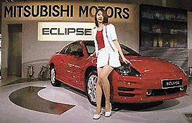 A model shows off a Mitsubishi Eclipse at the Beijing Auto China 2000 car exhibit on Tuesday. Over 430 cars on on display for the exhibit, which opens today and runs until June 12. � AP/PTI photo