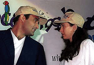 Akshaye Khanna and Karisma Kapoor talk to each other during the launch of  concerningpets.com, a website specialising in domestic animal matters, at a Delhi hotel on Wednesday.  � PTI photo 