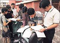 Students fill forms for admissions to Class XI in DAV College, Sector 10, Chandigarh, on Thursday