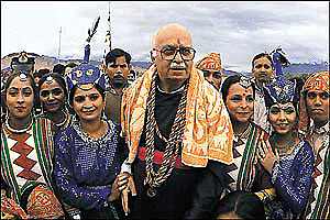 Home Minister L.K. Advani with the folk dancers on the occasion of Sindu darshan festival at Shyey, Ladakh on Thursday. � PTI photo