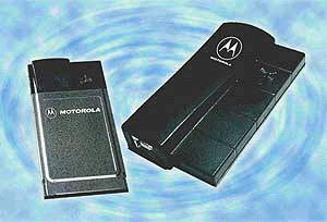 Motorola Corp. planned to announced on Monday, its "Bluetooth" products, PC card and USB accessory, right, for short-range wireless connections between computers and other devices. Motorola said IBM and Toshiba are expected to begin selling the attachments with their computers by late summer. Pricing information wasn't disclosed