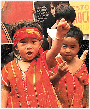 Children form a part of a demonstration by Burmese nationals in New Delhi on Monday on the 55th birthday of their imprisoned leader Aung San Suu Kyi. � Photo by Sondeep Shankar 