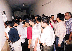A notice board in DAV College, Sector 10, Chandigarh becomes the focal point as admittion-seekers throng the college on Tuesday 