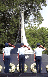 Air Force officials saluting at a "War Memorial" in honour of its martyrs who laid their lives in various operations since Independence, at a solemn function in New Delhi on Tuesday