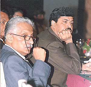 Information Technology Minister Pramod Mahajan with the Secretary P.V Jaikrishnan listening to speakers during a round table conference of ESCAP countries on information technology and Development in New Delhi on Wednesday