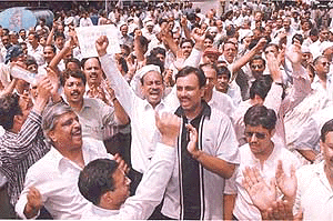 Mahanagar Telephone Nigam Limited employees taking out a demonstration in New Delhi on Thursday protesting against bifurcation of MTNL