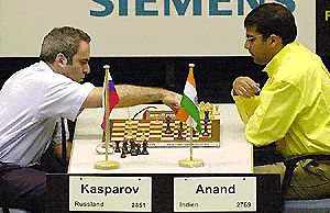 Russian Garri Kasparov, left, plays against Viswanathan Anand of India, in the first round at the Frankfurt Chess Masters on Thursday in Bad Soden, near Frankfurt Germany