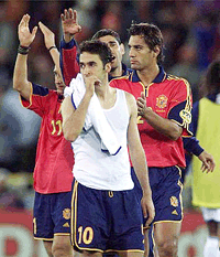 With tears in his eyes Raul of Spain stands in front of teammates Alfonso and Molina dat the end of the Euro 2000 quarterfinal on Sunday between France and Spain in Bruges