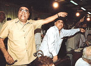 BJP and Congress members protest against the autonomy report in the Jammu and Kashmir Assembly on Monday