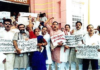 MLAs of BJP demonstrating in protest against killing of villagers and demanding arrest of activists of Ranveer Sena, at the gate of Bihar Assembly in Patna on Monday