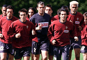 Portugal's players warm up during training in Ermelo, the Netherlands, on Monday. Portugal faces France at the European Soccer Championship semi-final in Brussels on Wednesday